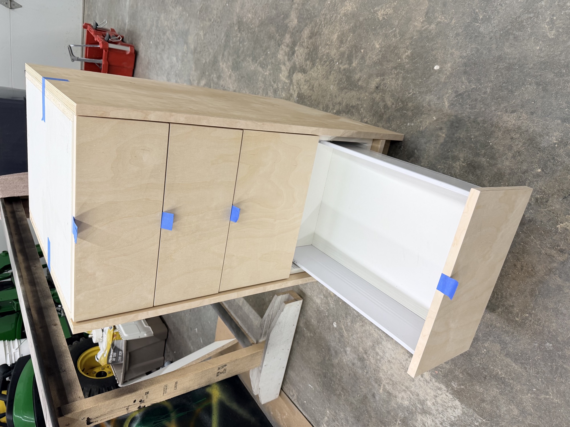 Custom tiny kitchen with cusctom cabinetry